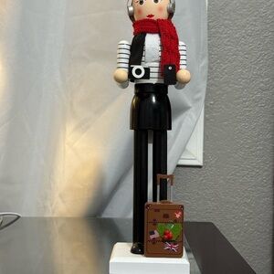 Stylish Nutcracker with Red Scarf and Suitcase